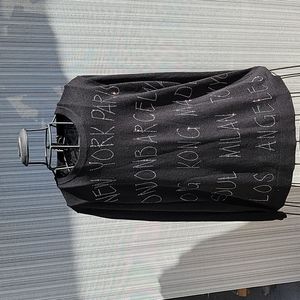 The Limited black sweater with silver studded country names